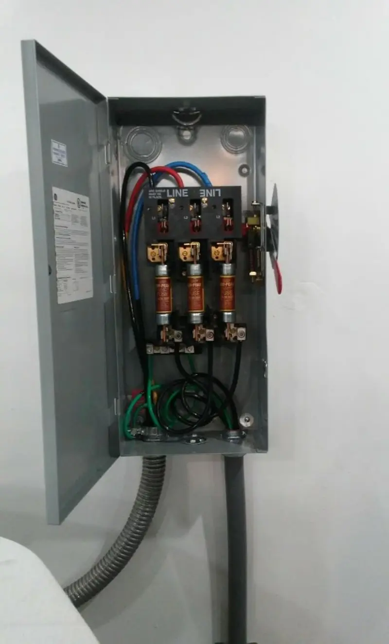 Three-phase disconnect switch installed for Smoke Detector Installation in Hyde Park